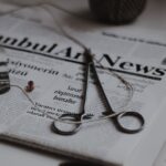 a picture of forceps on a newspaper about health and wellness news